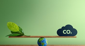 Carbon Studies Carbon Neutral and ESG Concepts. Carbon Emission, Clean Energy. Globe Balancing between a Green leaf and CO2. Sustainable Resources, Big deal for Company and Indstry to Concern about Environmental