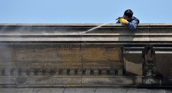 Façade Cleaning Shanghai, China - March 26: Exterior cleaning and building cleaning with high pressure water jet on March 26, 2016 in Shanghai, China. Shanghai is the largest Chinese city by population.