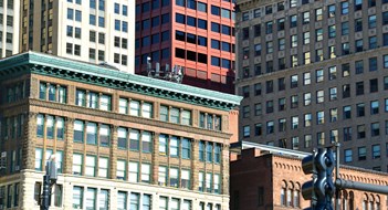 Dealing With Major Façade Projects Closely packed high rise buildings in city