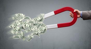 The Collections Process Businessman attracting money with a horseshoe magnet concept for business success, strategy or greed