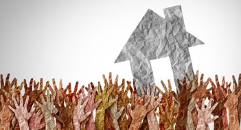 NHC's Housing Affordability Database Selling A Home as a group of diverse home buyers reaching for real estate success in a seller market as a symbol for buying a house and affordability challenges to residential ownership.